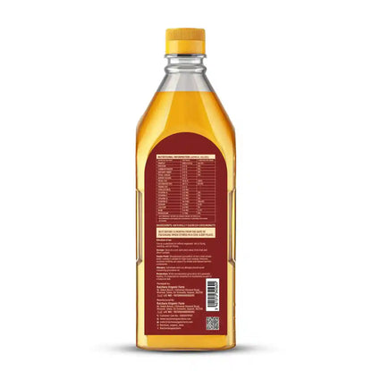Back view of a 1-liter bottle of wood pressed groundnut oil with nutrition label